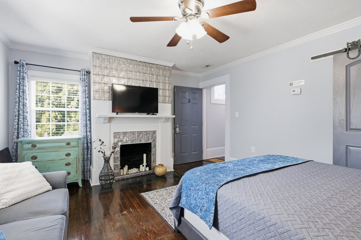 Bedroom and decorative fireplace