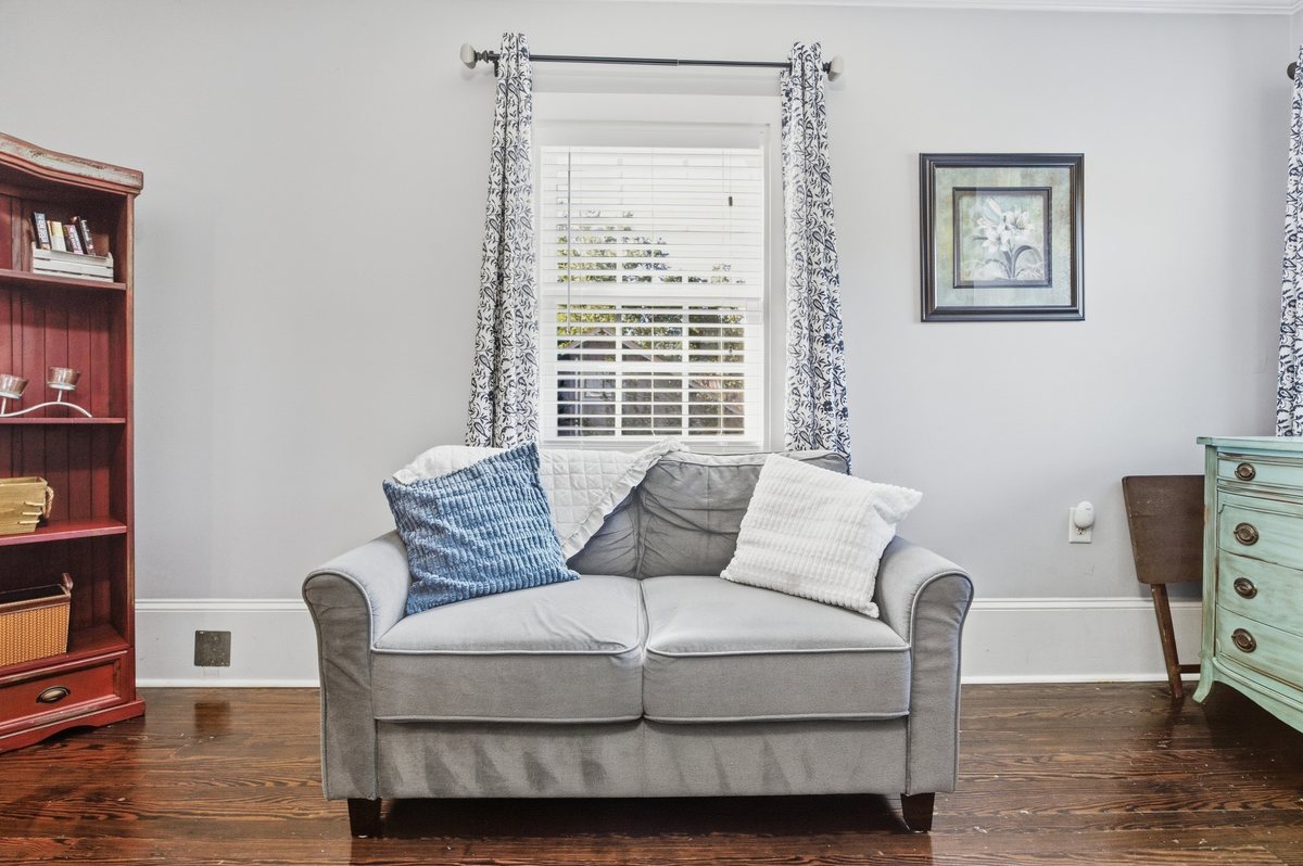 Loveseat within the bedroom