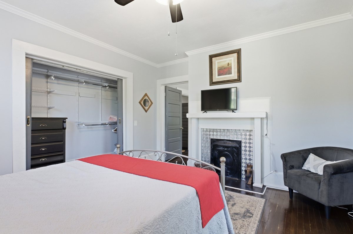 Bedroom and decorative fireplace