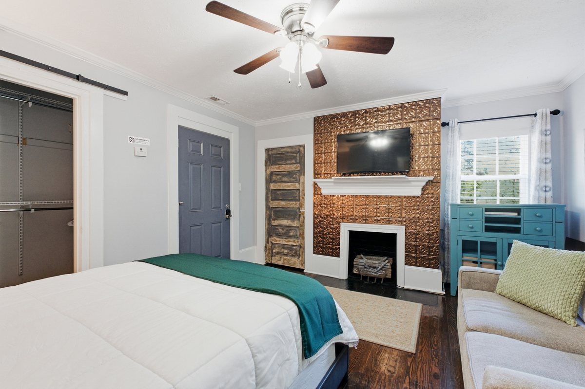 Bedroom and decorative fireplace